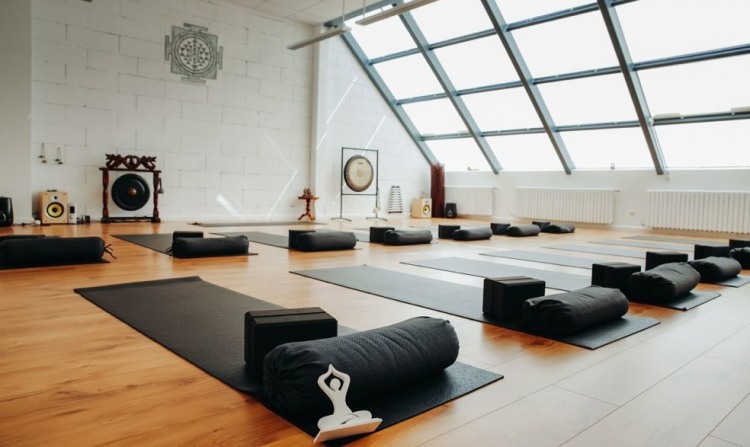 Close up of a yoga mat on dark floor