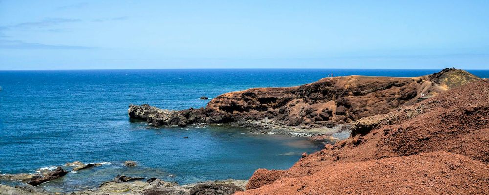 Panoramic view of a peaceful yoga space with lava lighting